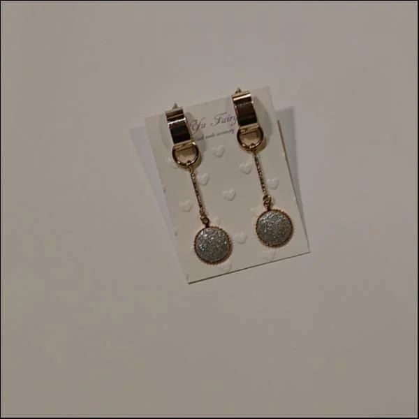 round charm earring